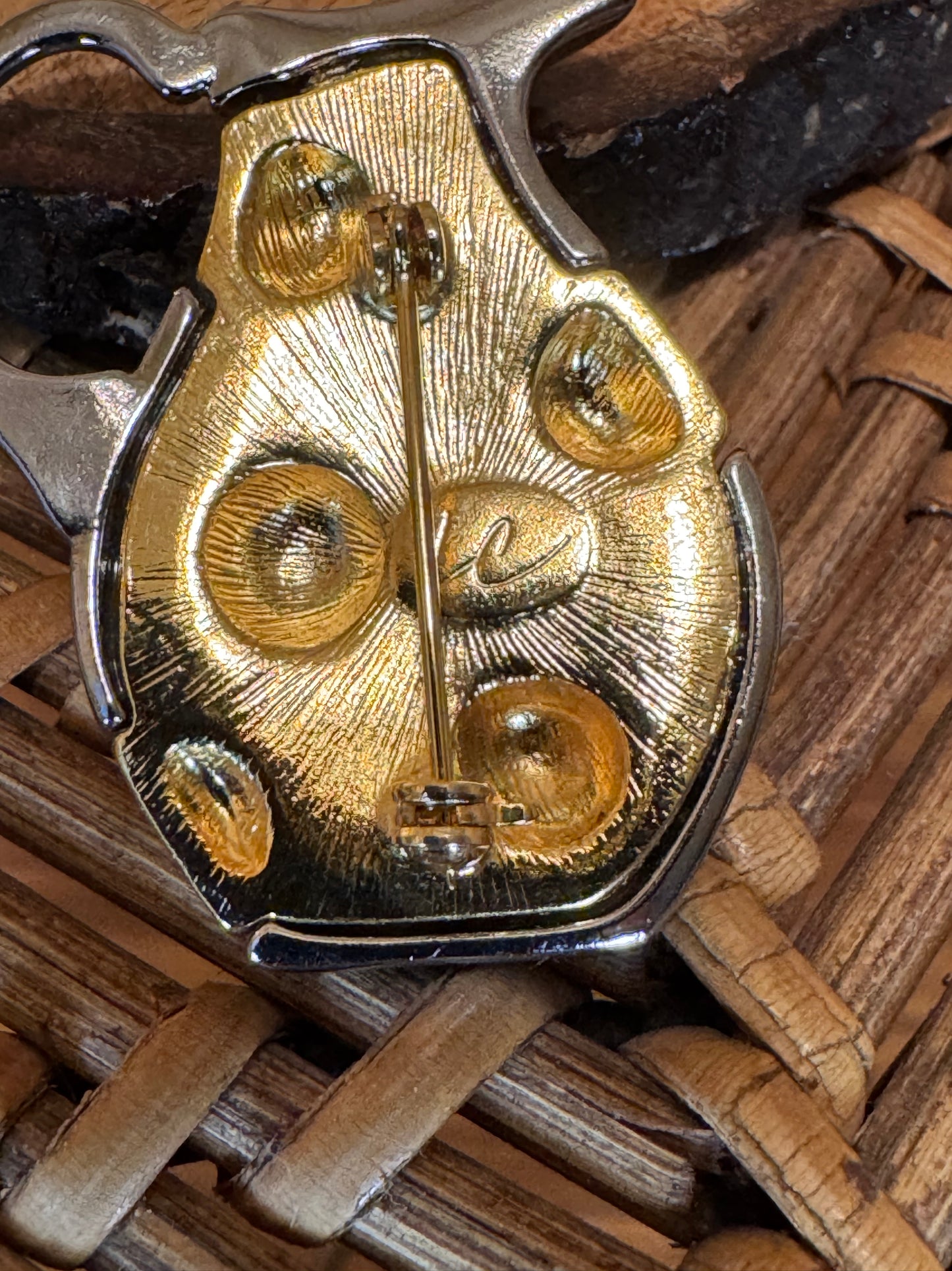 Vintage Liz Claiborne lemonade pitcher brooch pin featuring a two-tone gold and silver design