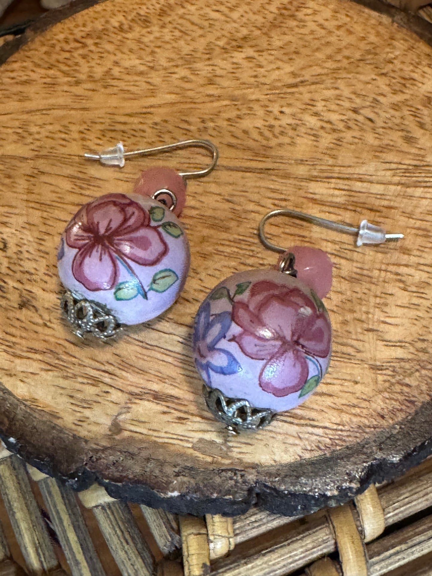 Vintage inspired dangle earrings featuring hand-painted porcelain beads with floral designs