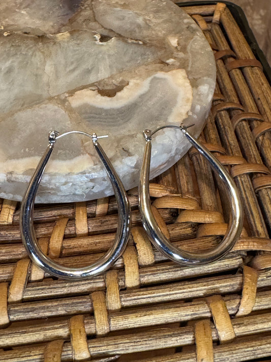 Polished silver-toned teardrop hoop earring
