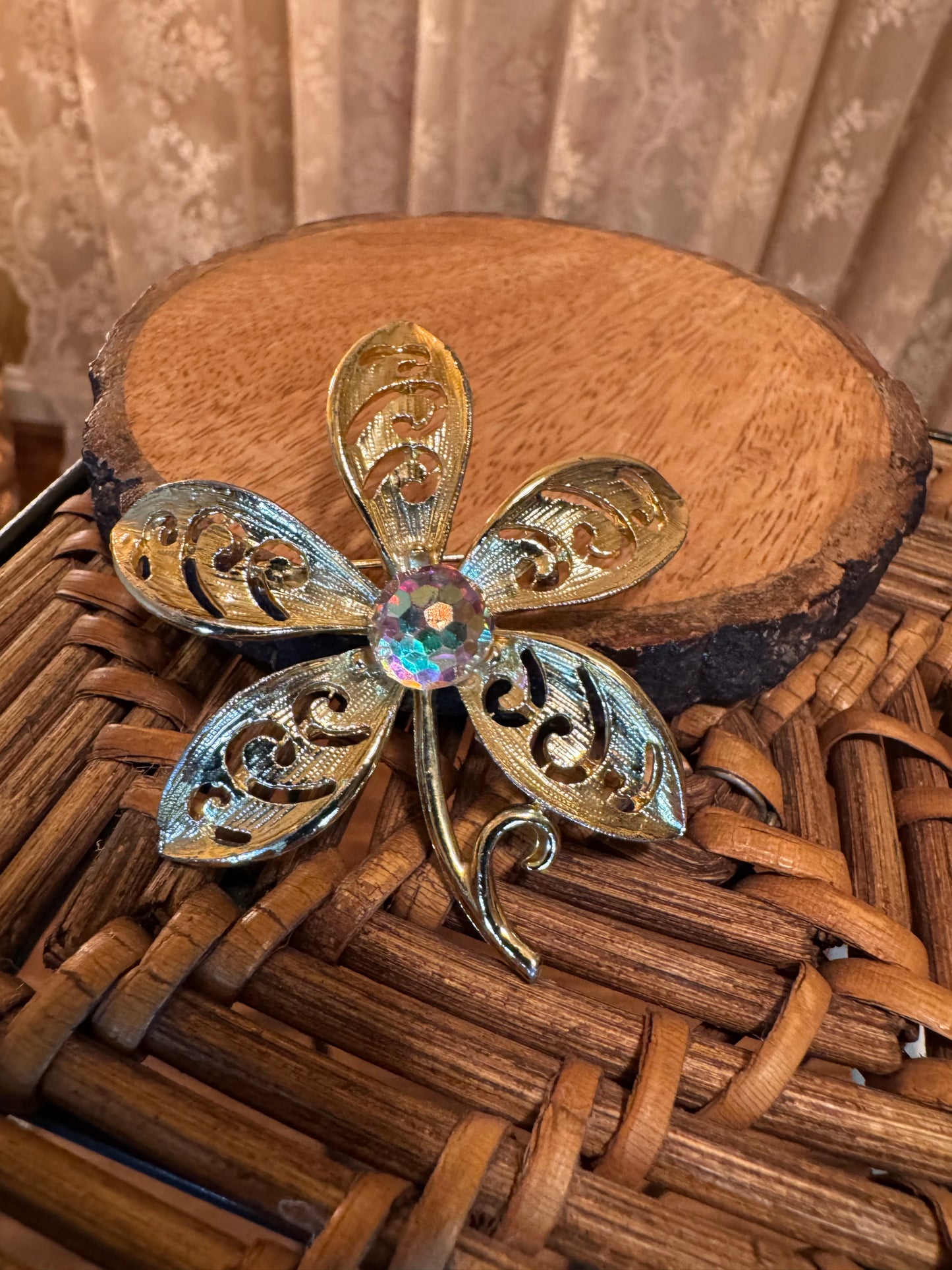 Vintage Gold-Tone Floral Brooch with Faceted Aurora Borealis Crystal Center
