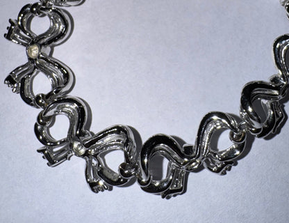 Vintage Signed Lisner Bow Bracelet in Silver Tone