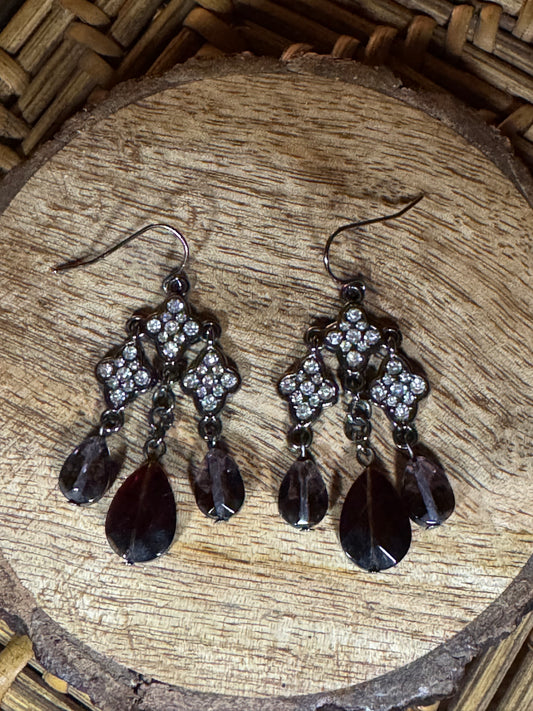 Silver Tone Vintage-inspired chandelier earrings with clear crystals and purple gems