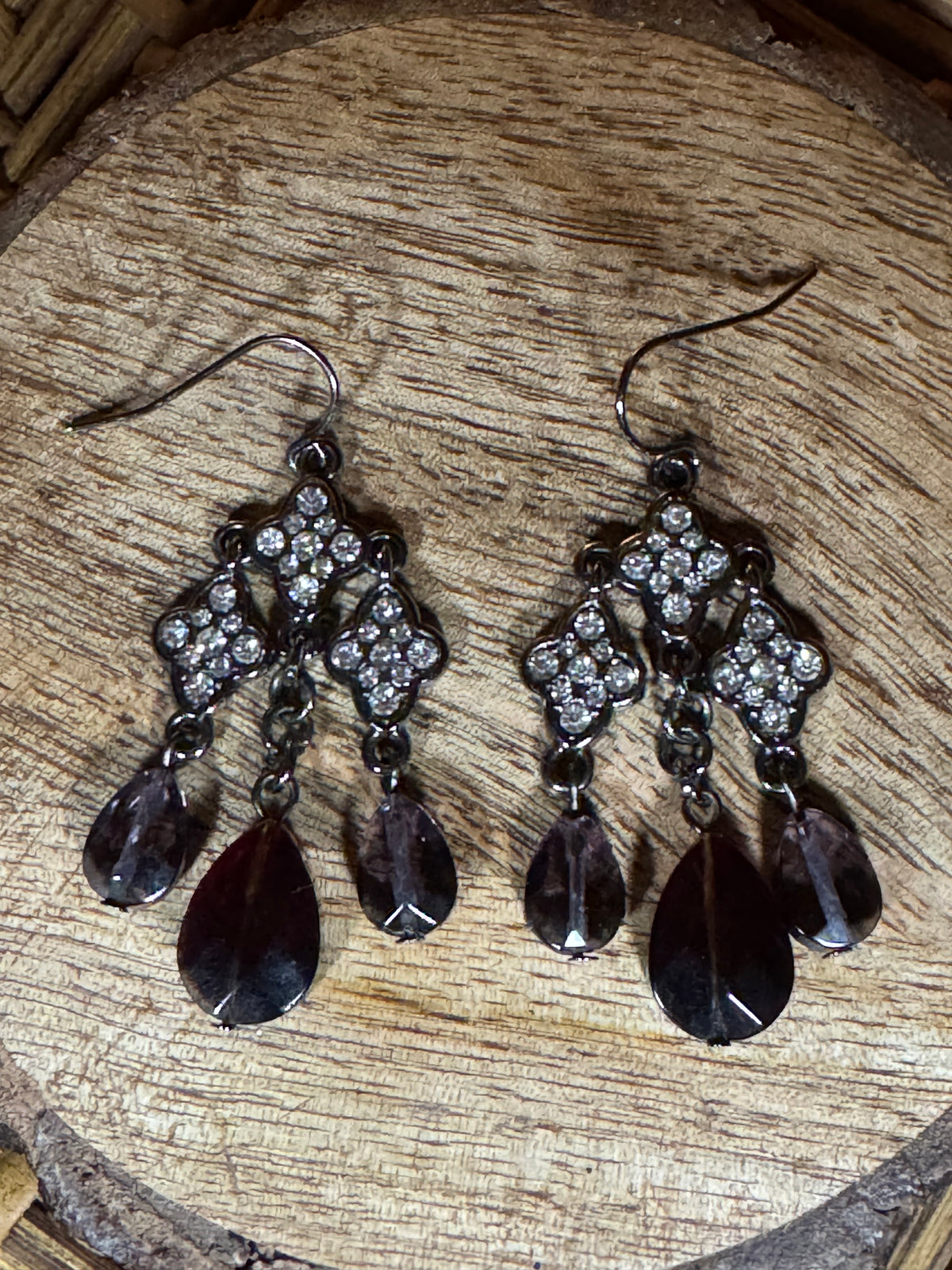 Silver Tone Vintage-inspired chandelier earrings with clear crystals and purple gems
