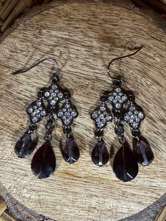 Silver Tone Vintage-inspired chandelier earrings with clear crystals and purple gems
