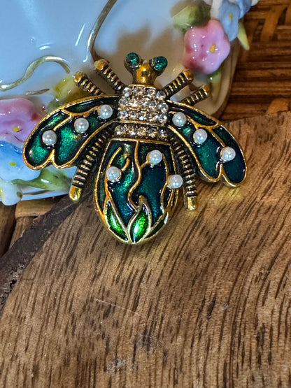 Gold Tone Insect Brooch with Green Enamel and Rhinestone Accents