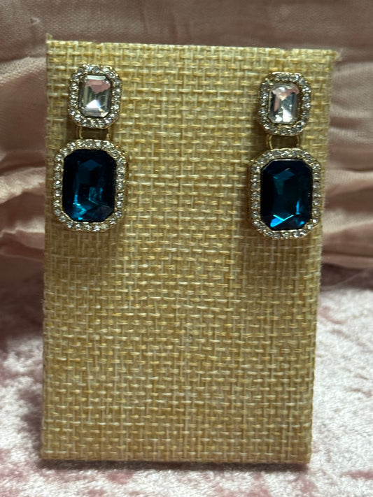 Vintage old tone crystal drop earrings with dark blue emerald-cut stones