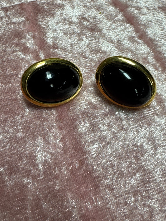 Vintage Trifari black lucite oval dome stud earrings with a goldtone setting