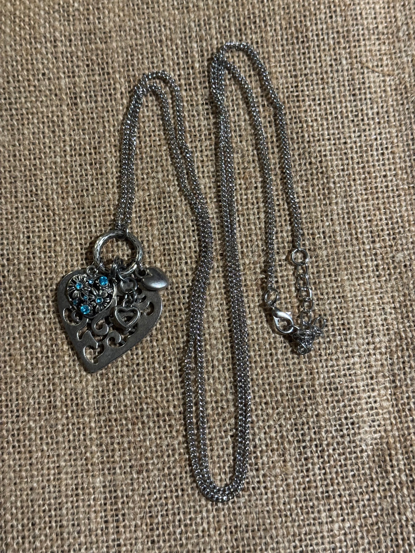 Silver-Tone Filigree Heart Pendant Necklace with Blue Crystal Accents