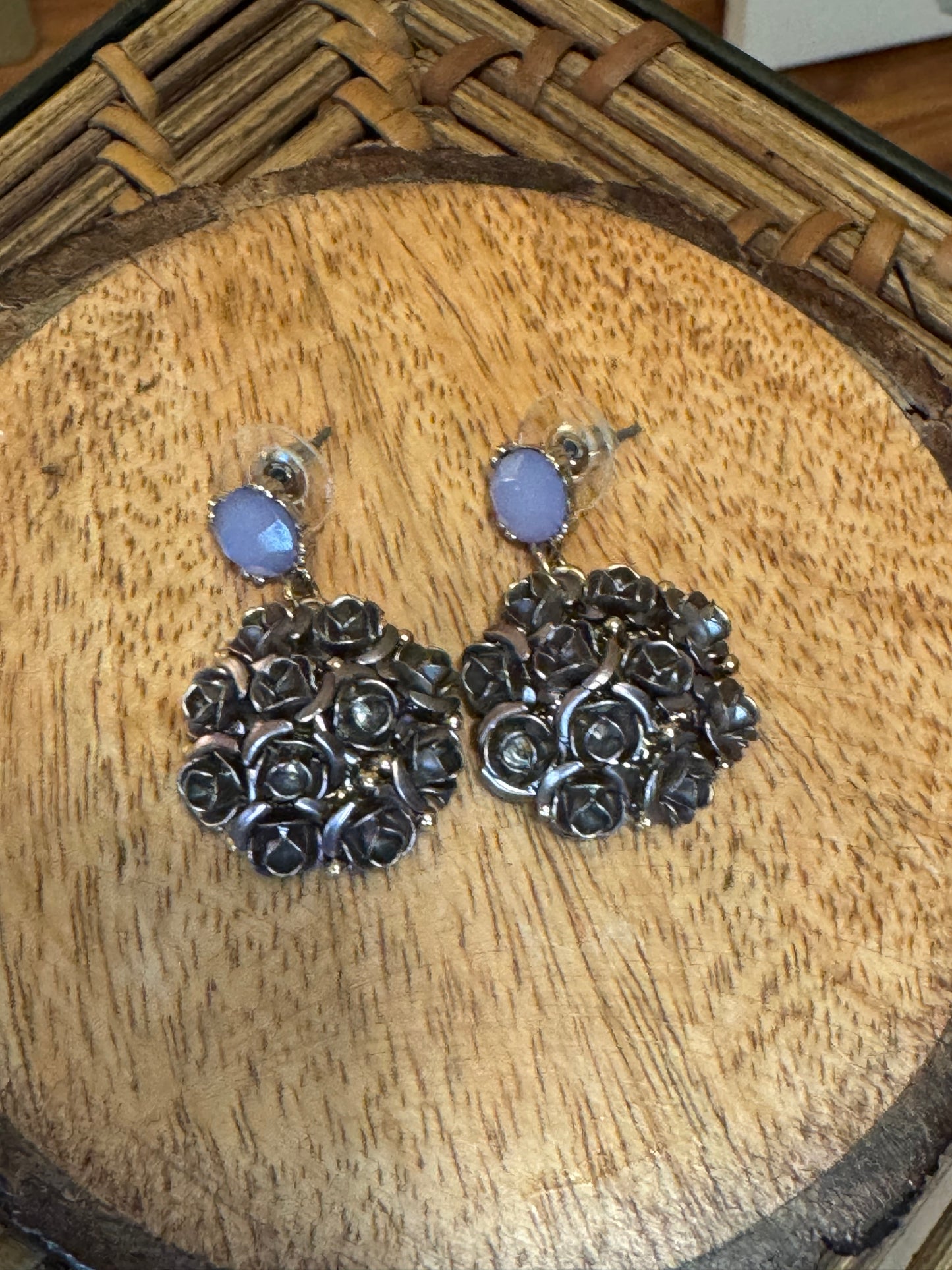 1928 brand silver-tone and antiqued black flower cluster earrings featuring purple crystal posts