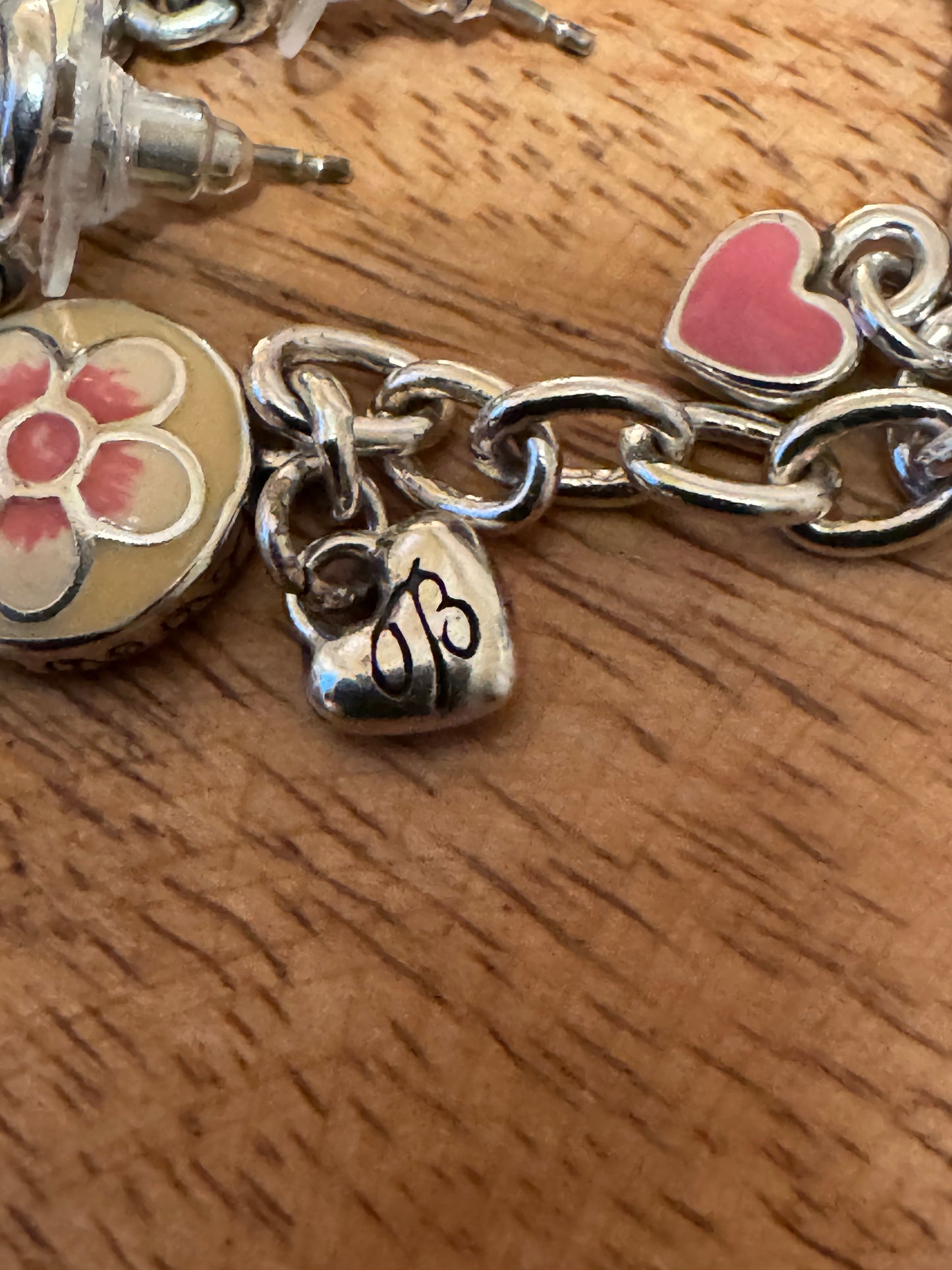Vintage and Retired Brighton Spring Fever enamel and silver-plated flower earrings and charm bracelet set