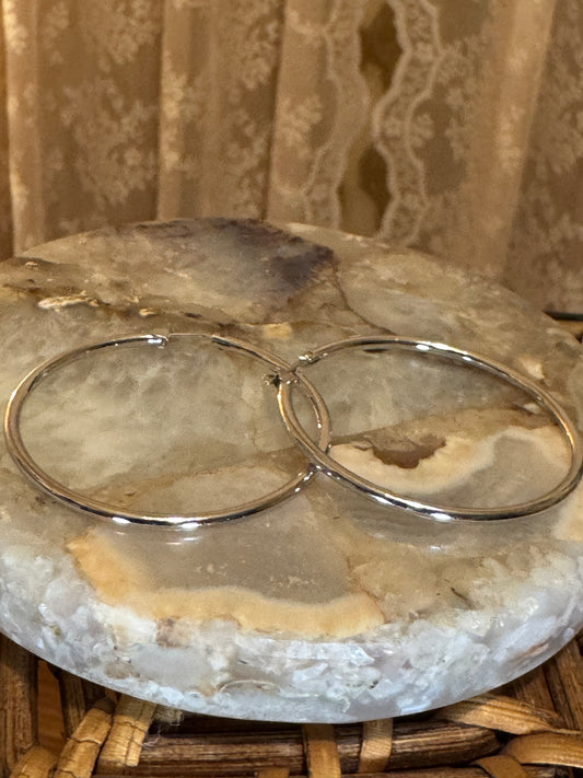 Polished silver-toned hoop earring