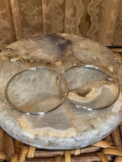 Polished silver-toned hoop earring