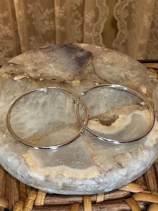 Polished silver-toned hoop earring