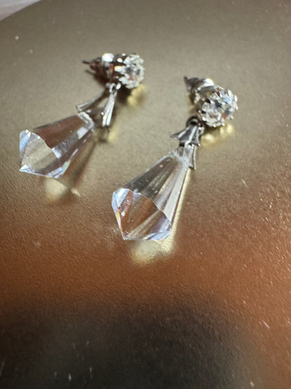 Vintage inspired silver tone linear drop earrings featuring faceted clear glass crystal icicle drops