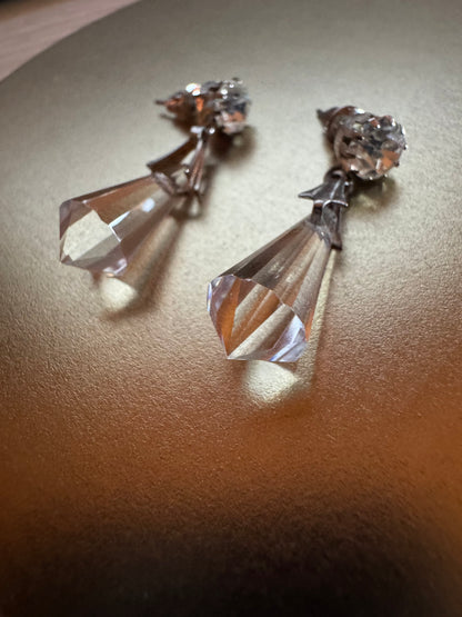 Vintage inspired silver tone linear drop earrings featuring faceted clear glass crystal icicle drops