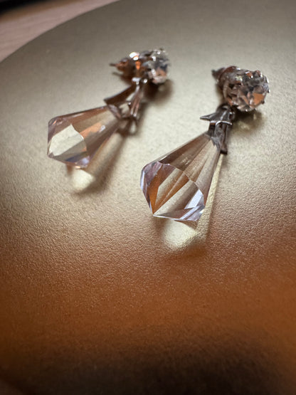 Vintage inspired silver tone linear drop earrings featuring faceted clear glass crystal icicle drops