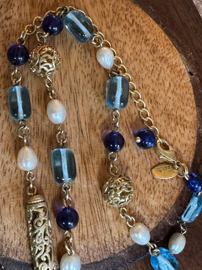 Lia Sophia necklace features a long, beaded design with a blue, gold-tone, and faux pearl color scheme