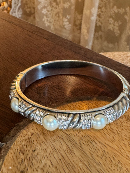 Vintage signed Brighton "Pearl Magic" silver-plated hinged bangle bracelet featuring faux pearls and clear crystals