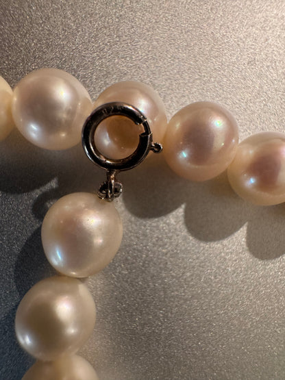 Exquisite Vintage Strand of Freshwater Cultured Pearls featuring a Sterling Silver (marked 925) Clasp