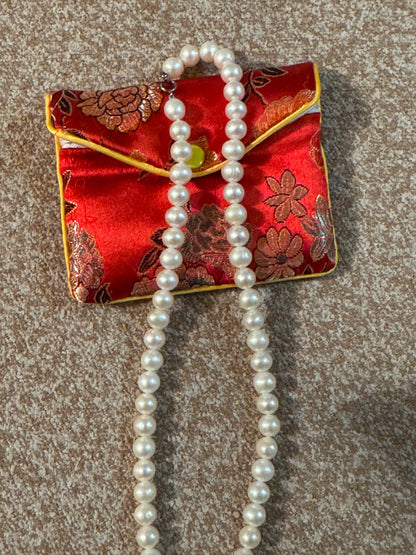 Exquisite Vintage Strand of Freshwater Cultured Pearls featuring a Sterling Silver (marked 925) Clasp