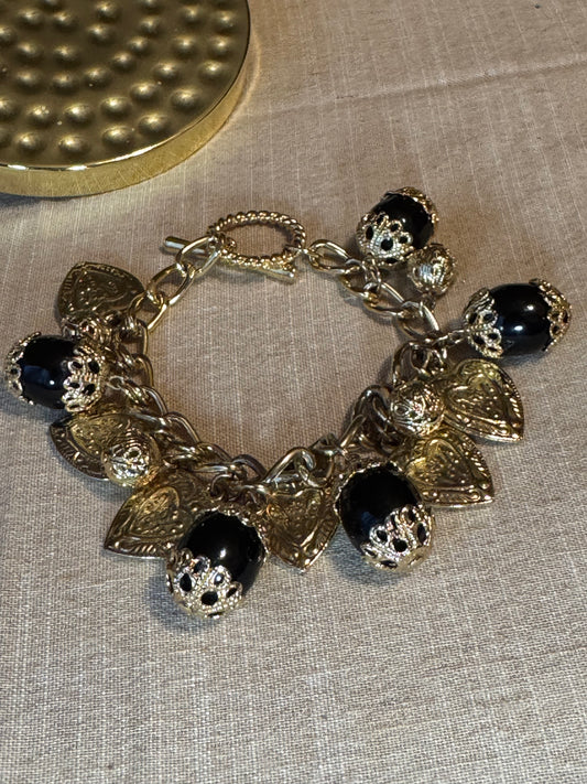Vintage-Style Gold Tone Puffy Heart & Black Glass Charm Bracelet – Chunky Filigree Toggle