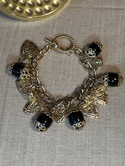Vintage-Style Gold Tone Puffy Heart & Black Glass Charm Bracelet – Chunky Filigree Toggle