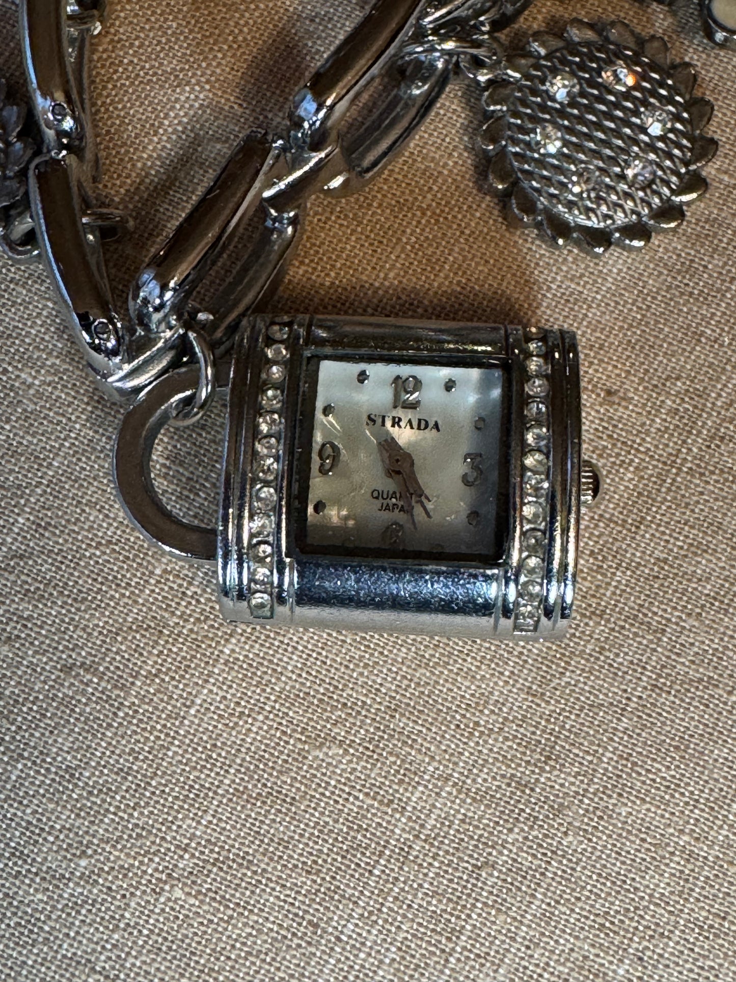 Strada Silver Tone Charm Bracelet Watch – Floral & Crystal Accents