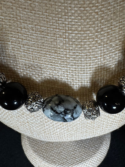 Statement Graduated Black Bead & Ornate Silver-Tone Necklace — Sculptural Elegance & Timeless Presence