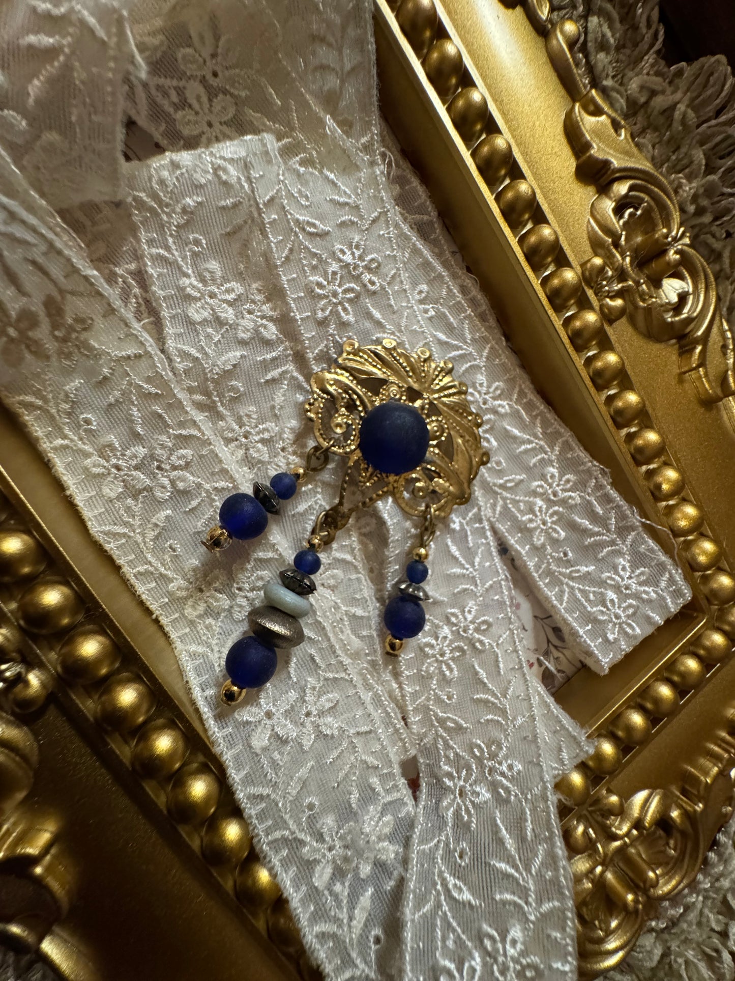 Vintage Gold-Tone Filigree Brooch with Blue Stones