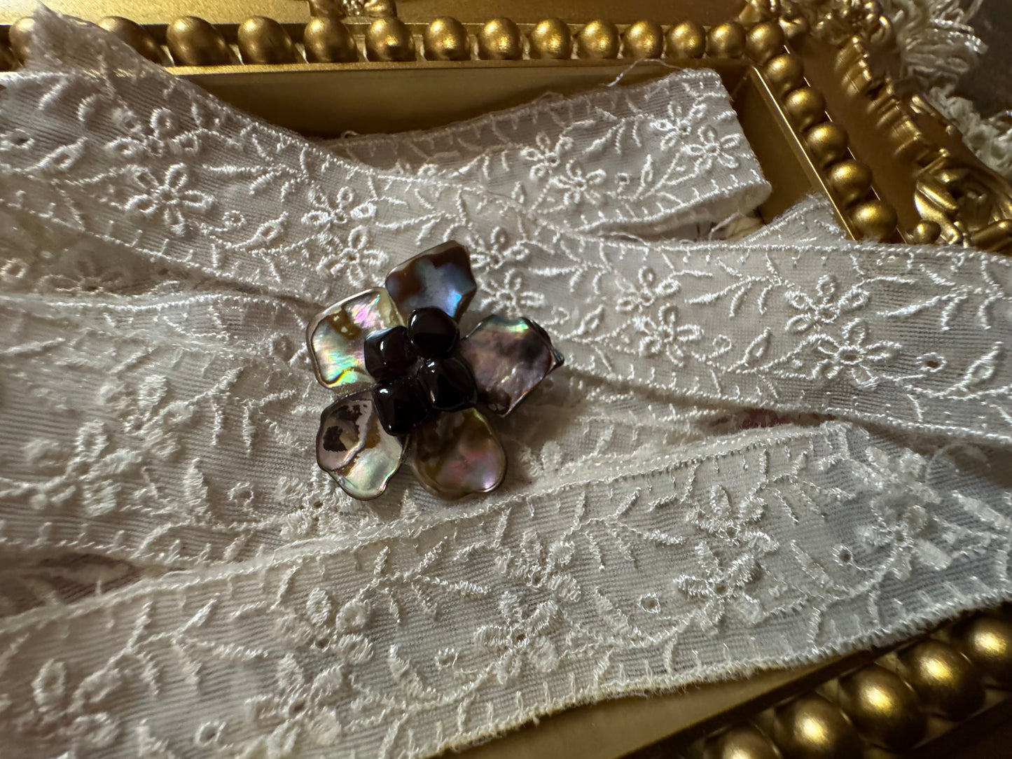 Vintage Flower Brooch - Iridescent Shell and Black Stones