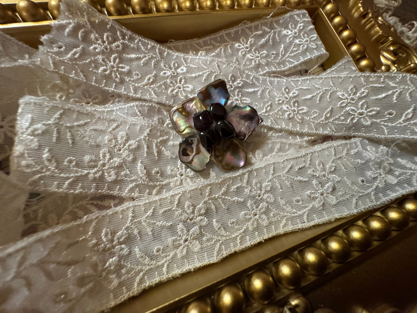Vintage Flower Brooch - Iridescent Shell and Black Stones