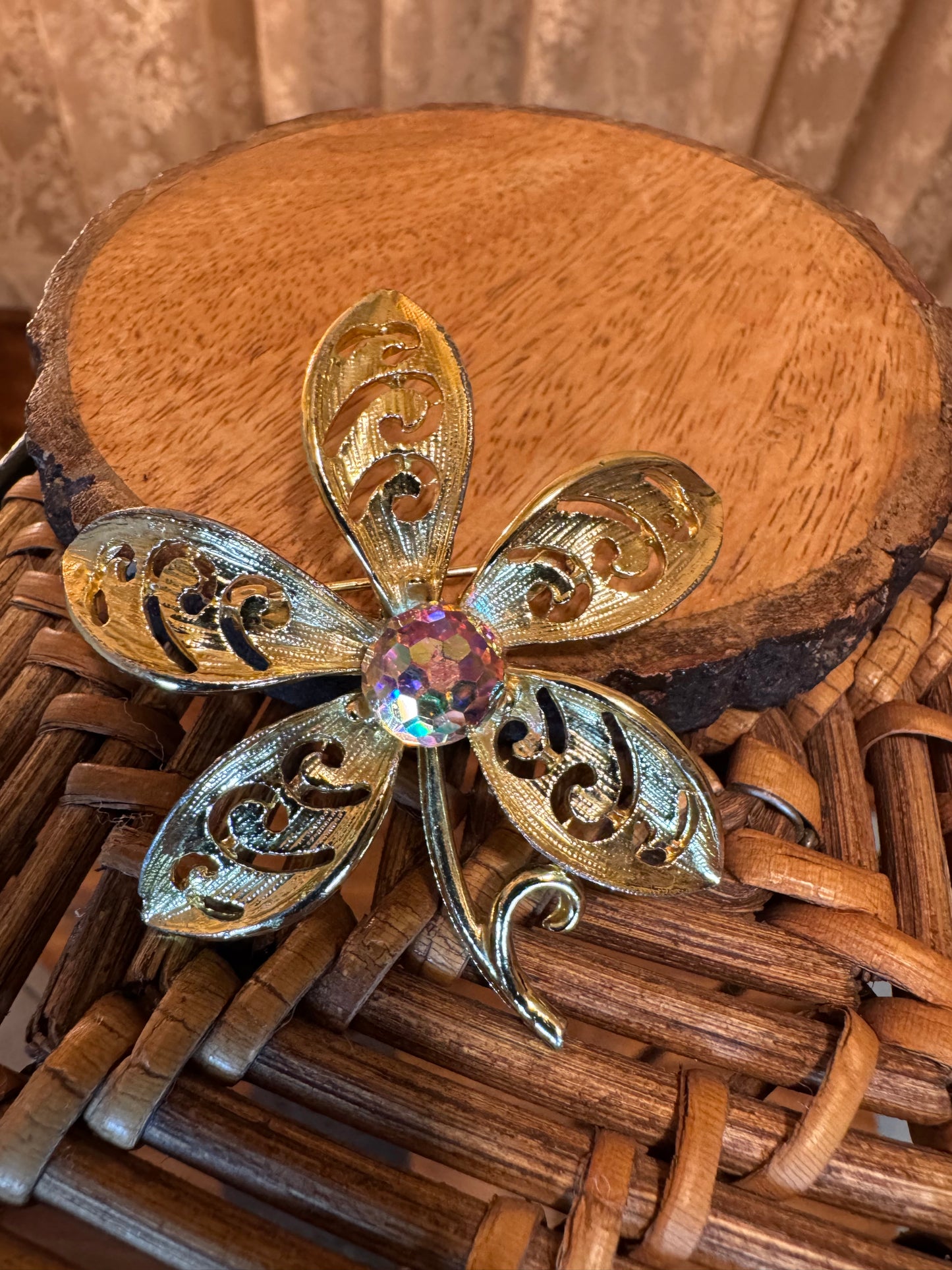 Vintage Gold-Tone Floral Brooch with Faceted Aurora Borealis Crystal Center